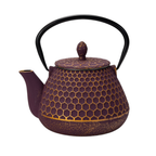 Purple honeycomb-patterned cast iron teapot with curved black handle, sturdy spout, and textured surface for grip.