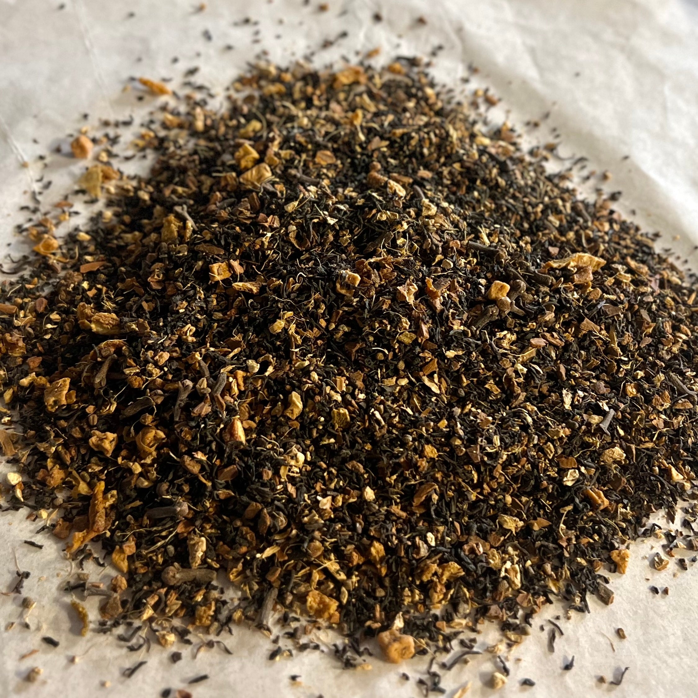 Loose chai tea blend with black tea leaves, cinnamon, ginger, and cardamom spices for a flavorful masala chai experience
