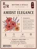 A tea product label for R&R Rhythms & Rituals 'Amidst Elegance' tea, featuring a beige background with dark red text and border, floral illustrations of hibiscus and marigold, and ingredient details.