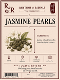 Front of a tea product label for R&R Jasmine Pearls tea from The Fujian Province, featuring an illustration of jasmine flowers and buds, ingredients text, brewing temperature and time icons, and a barcode.