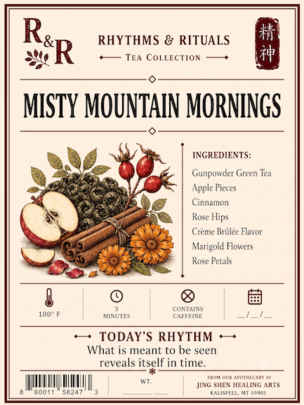 Rhythm & Rituals 'Misty Mountain Mornings' tea collection label, featuring a vintage-style illustration of green tea leaves, cinnamon sticks, apple slices, rose hips, and orange flowers on a cream background with a brown border.