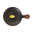 Top view of black Porcelin Mug with wooden handle and lid, showcasing minimalist modern design and textured ceramic surface.