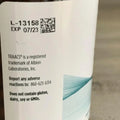 Back label of a product with a QR code, expiration date, and contact information.